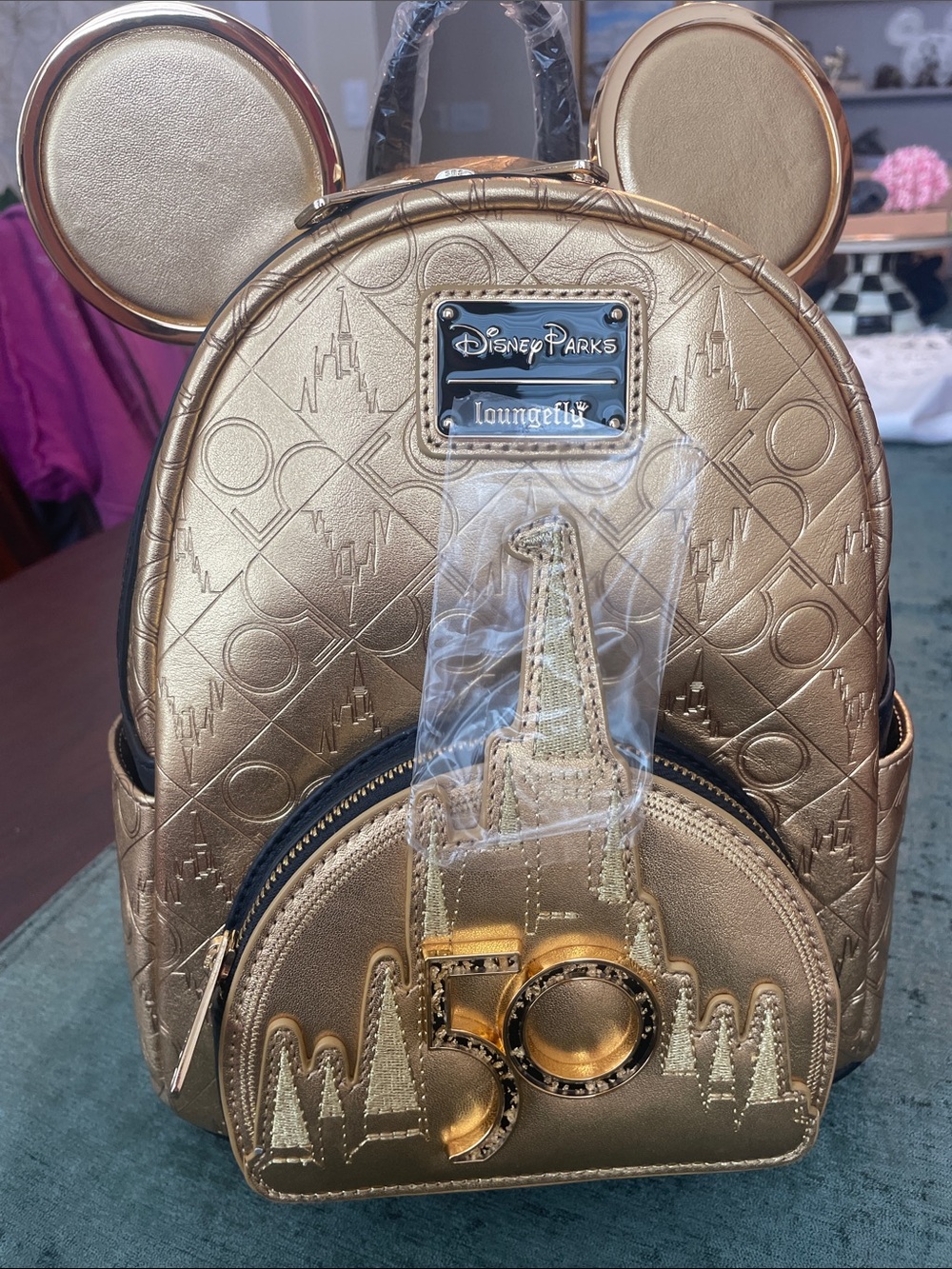 Disney Parks 50th Celebration Metallic Gold Castle, full leather, NWT.